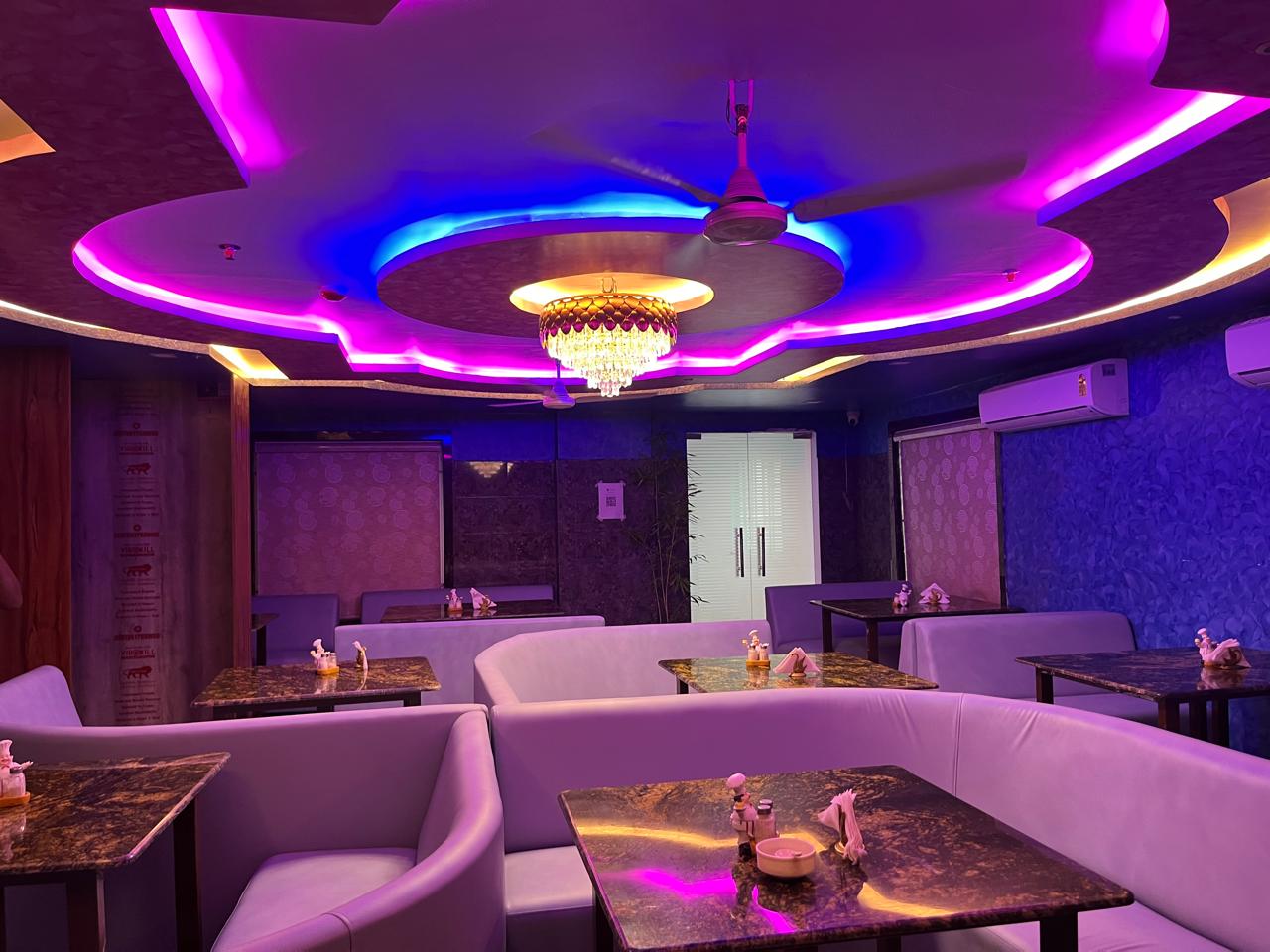 Lotus Grand interior with the signature flower-shaped glowing ceiling and gold chandelier